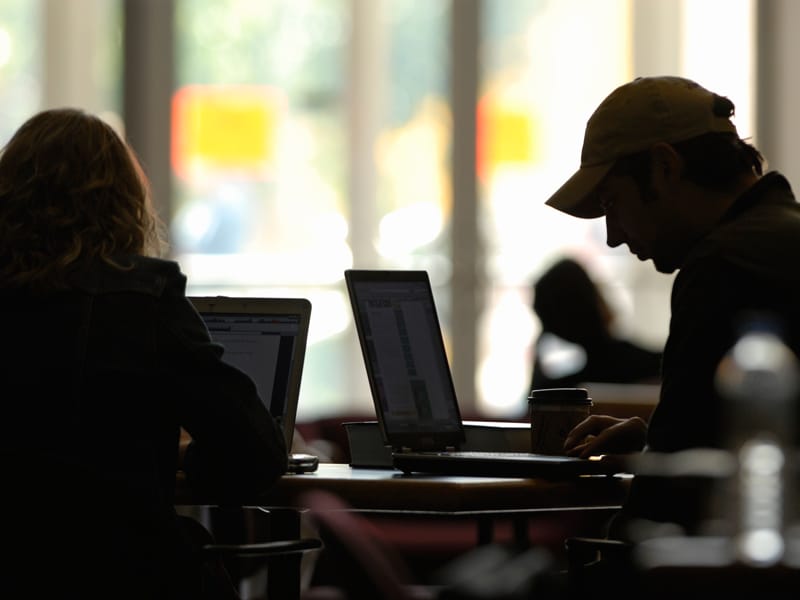 Students studying with laptops
