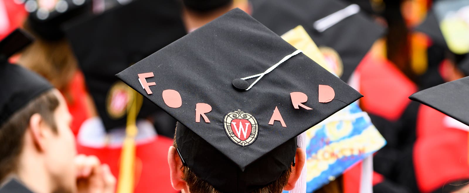 A 2019 graduate's mortar board, with a message atop reading 'Forward'