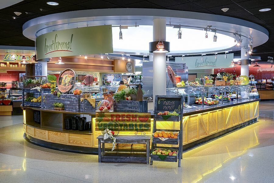 Fresh fruit and vegetables on display at Great Greens food station in Four Lakes Market.