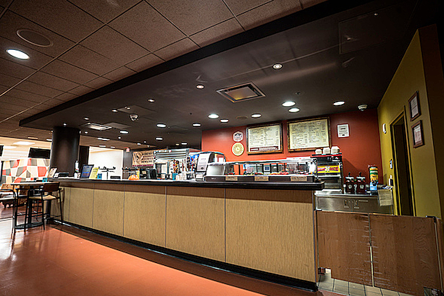 Wood paneled sales and recreational rental counter at The Sett Recreation.