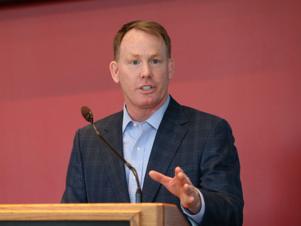 Eichorst stands behind a podium.