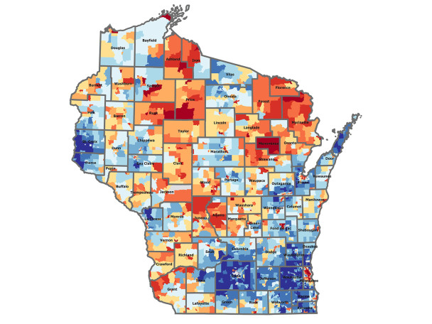 A color‑coded map of Wisconsin shows varying levels of social disadvantage by county and census tract, ranging from blue for least disadvantaged areas to red for most disadvantaged areas.