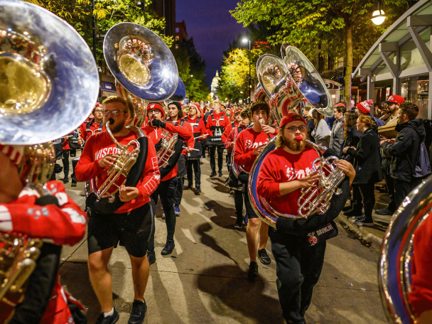Members of the UW Marching Band march down State Street during the Homecoming Parade.