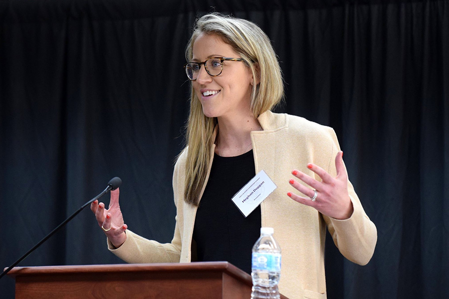 Meghan Duggan speaking from a podium.