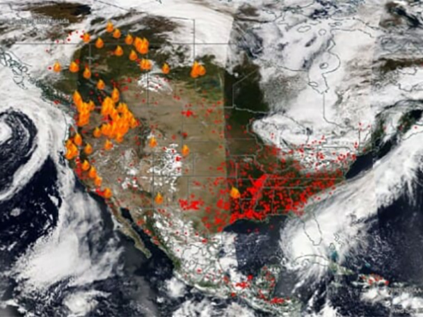 A satellite image of North America with fire icons overlaid in areas with active wildfires.