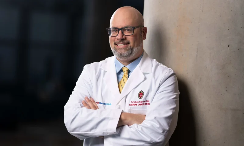 Portrait of Christian Capitini in a lab coat.