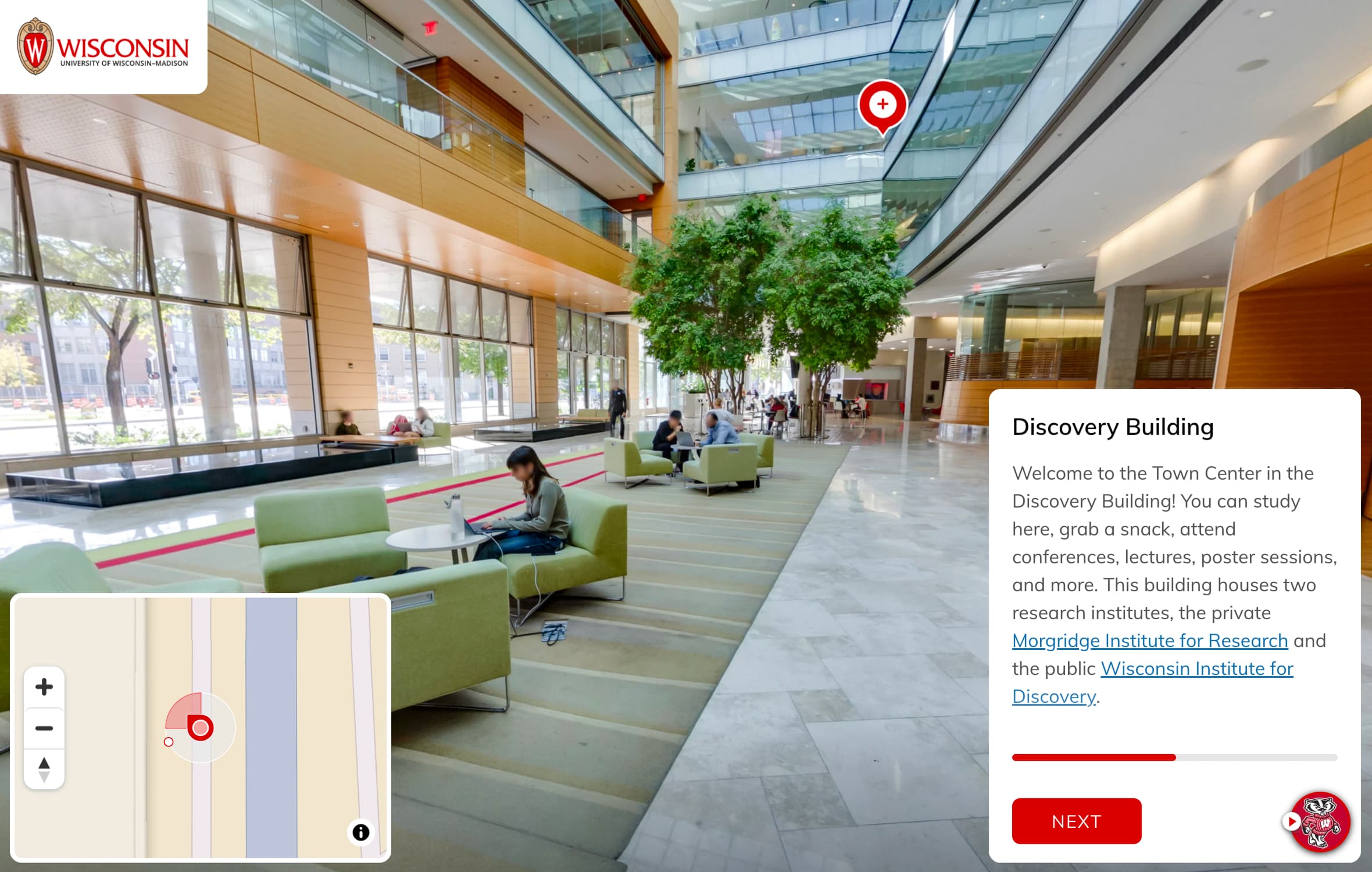 A self-guided tour screenshot showing a bright atrium with seating areas, people seated, a description of the building, and an interactive map.